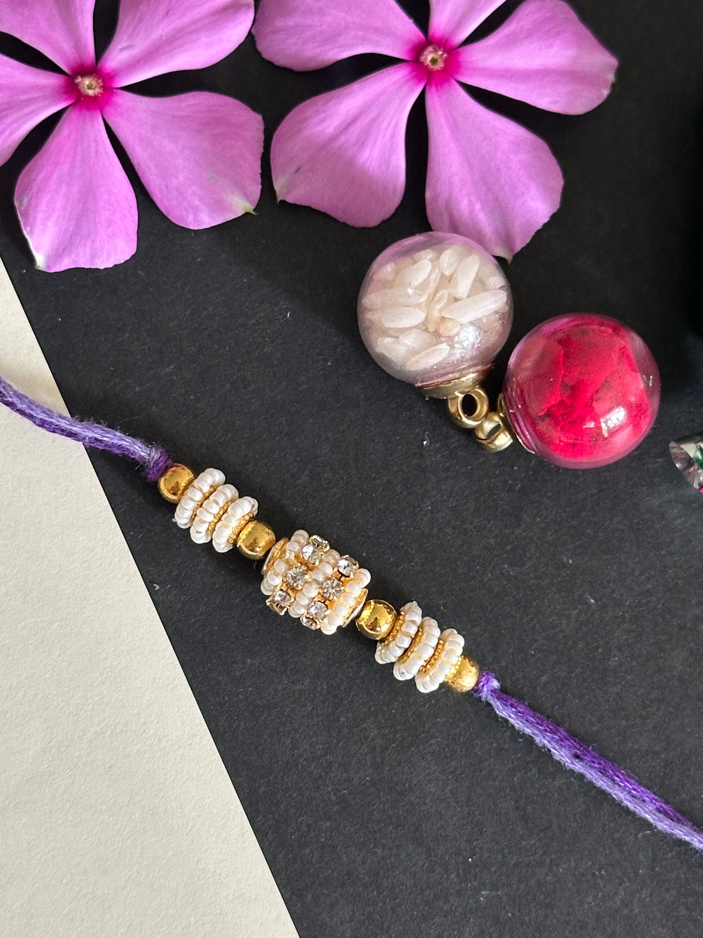 Embellished pearl rakhi