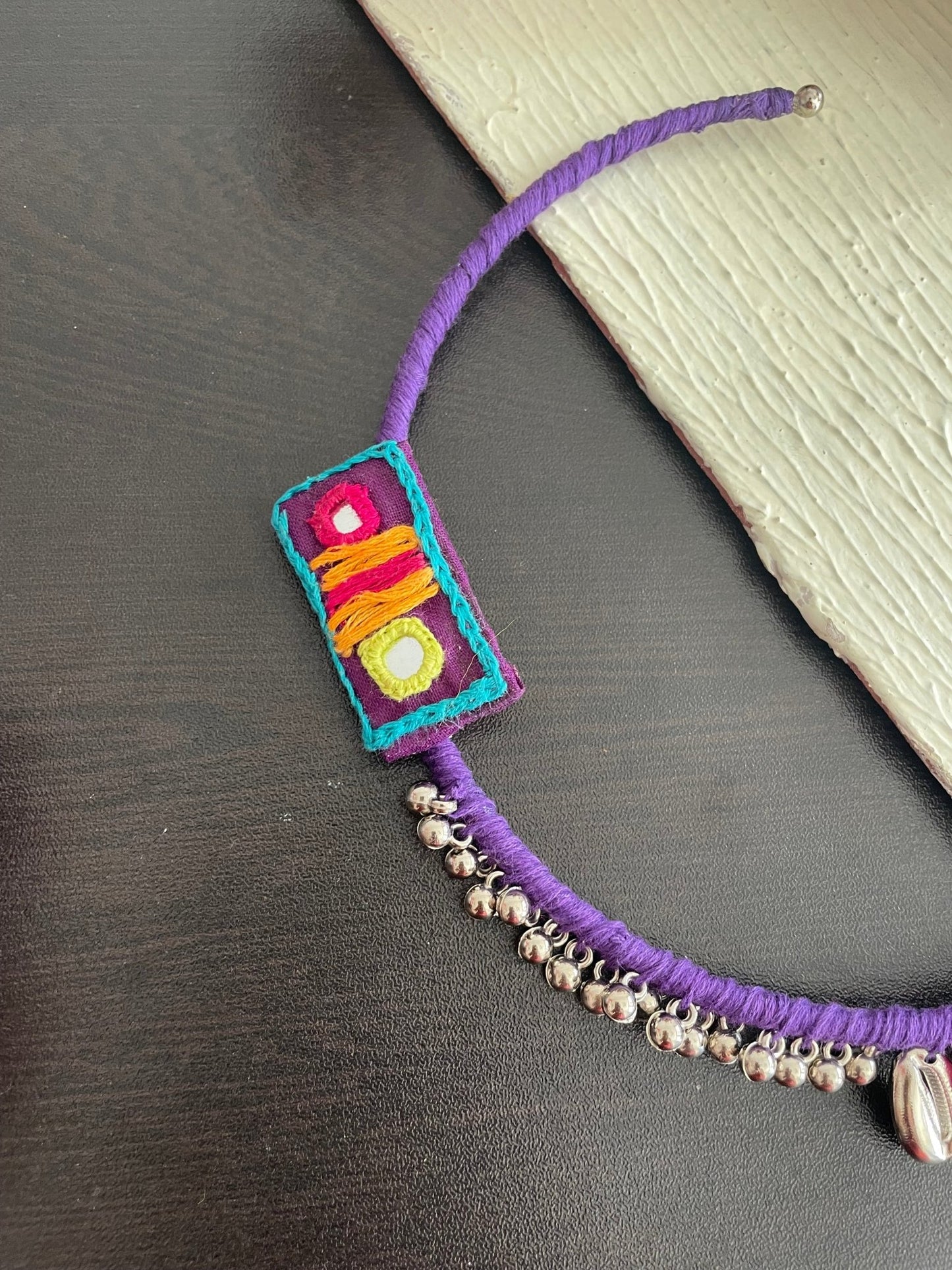 Purple saga hasli and earrings - Kalakari