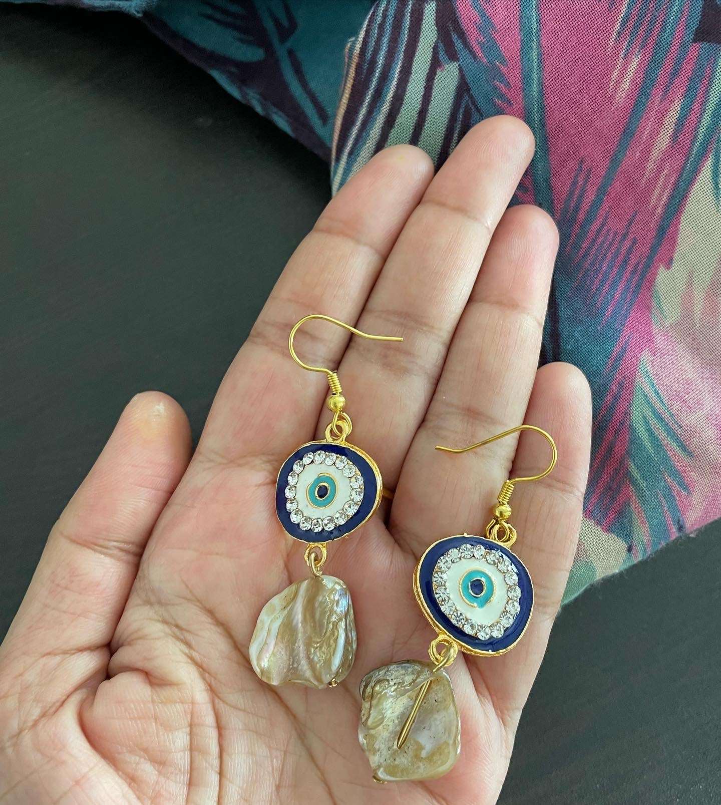 Evil eye and mother of pearl dangler