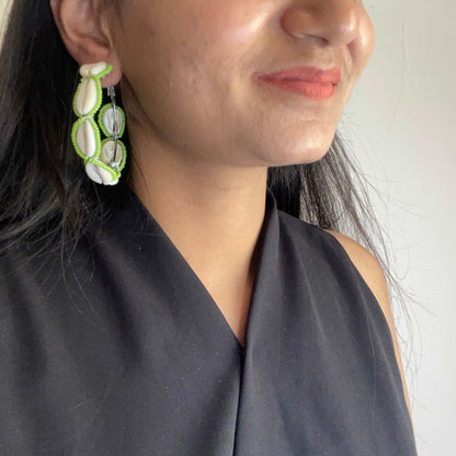 Green beaded shell hoops