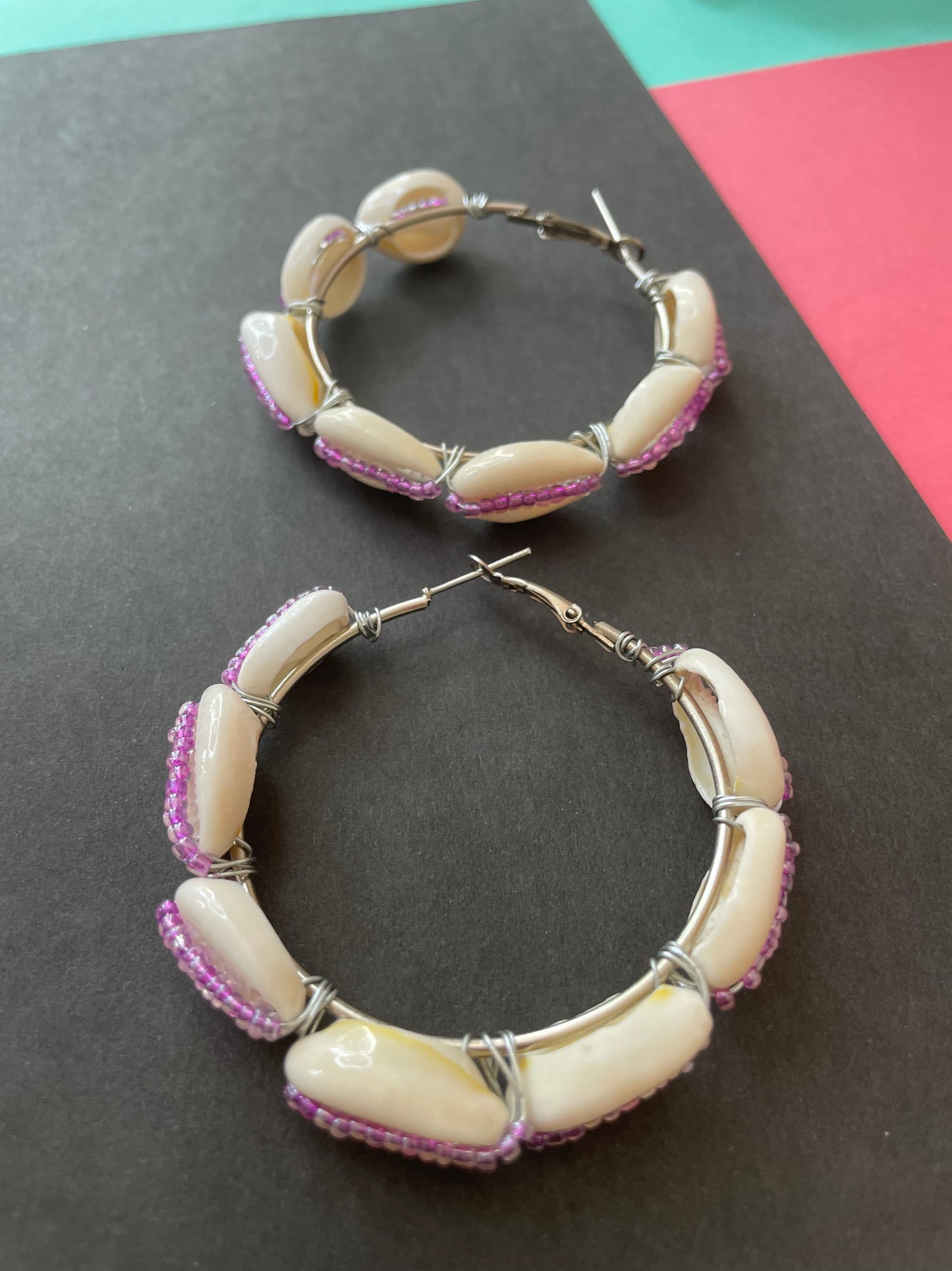 Purple beaded shell hoops