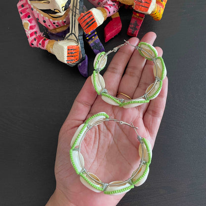 Green beaded shell hoops