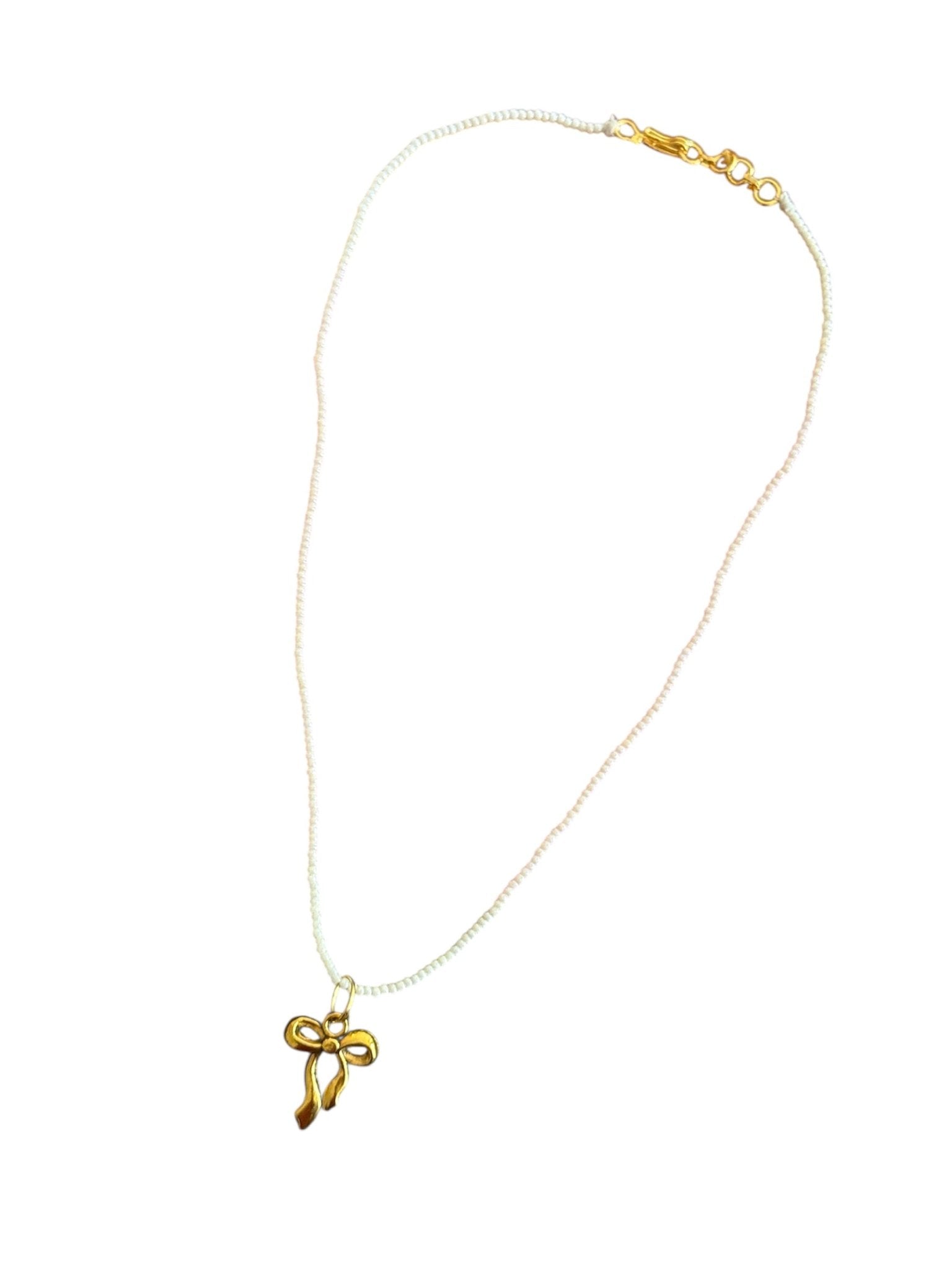 Beaded golden bow charm necklace - Kalakari