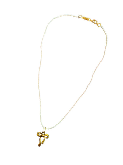 Beaded golden bow charm necklace - Kalakari