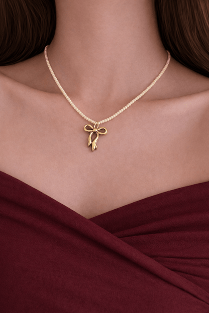 Beaded golden bow charm necklace - Kalakari