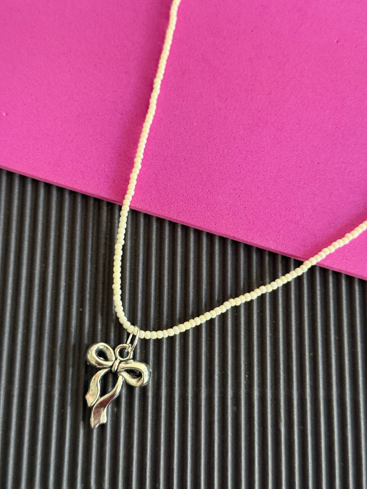 Beaded silver bow charm necklace - Kalakari