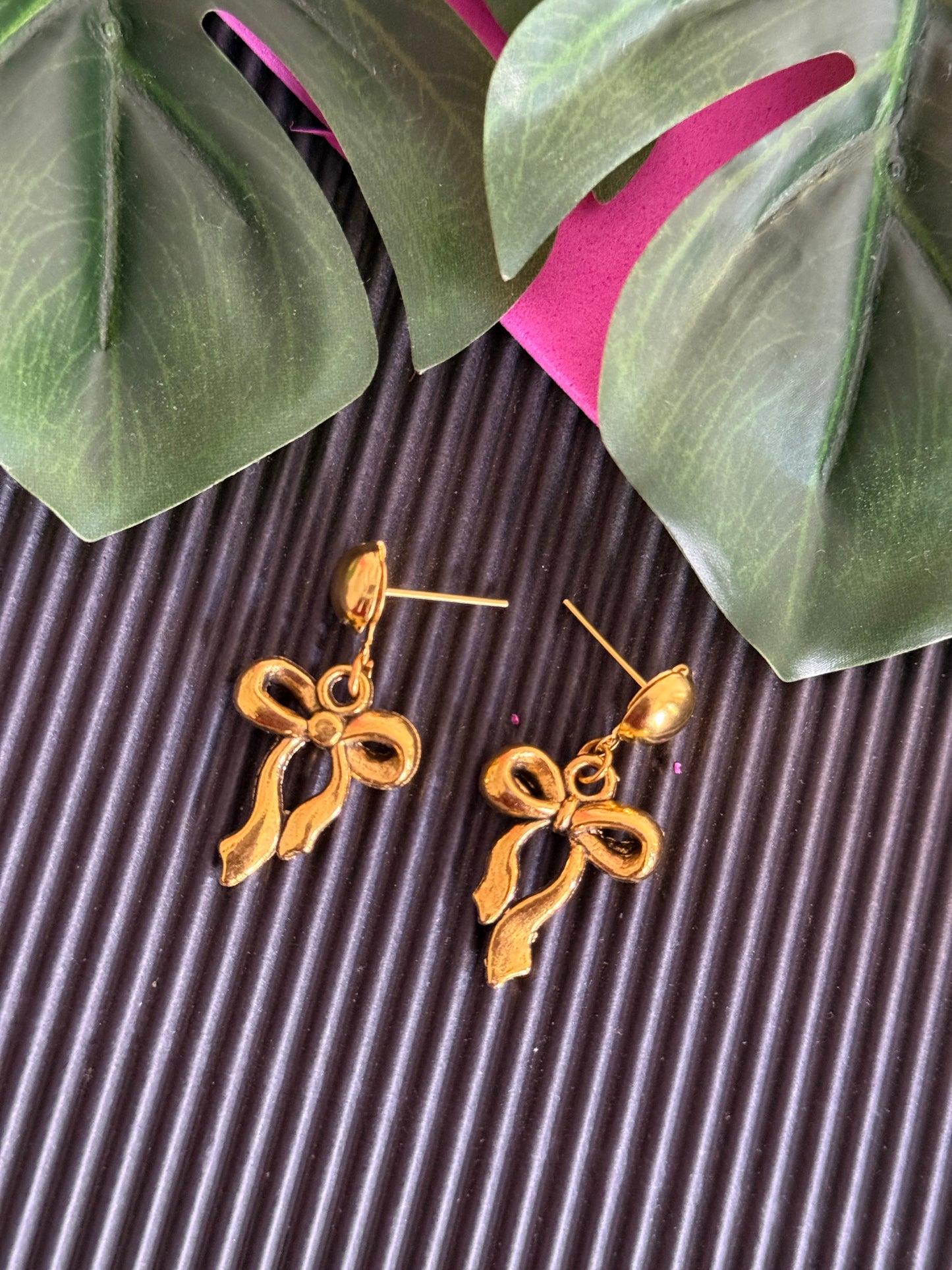 Golden bow earrings