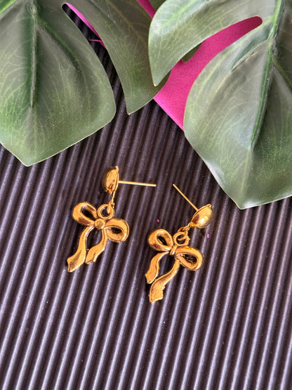Golden bow earrings